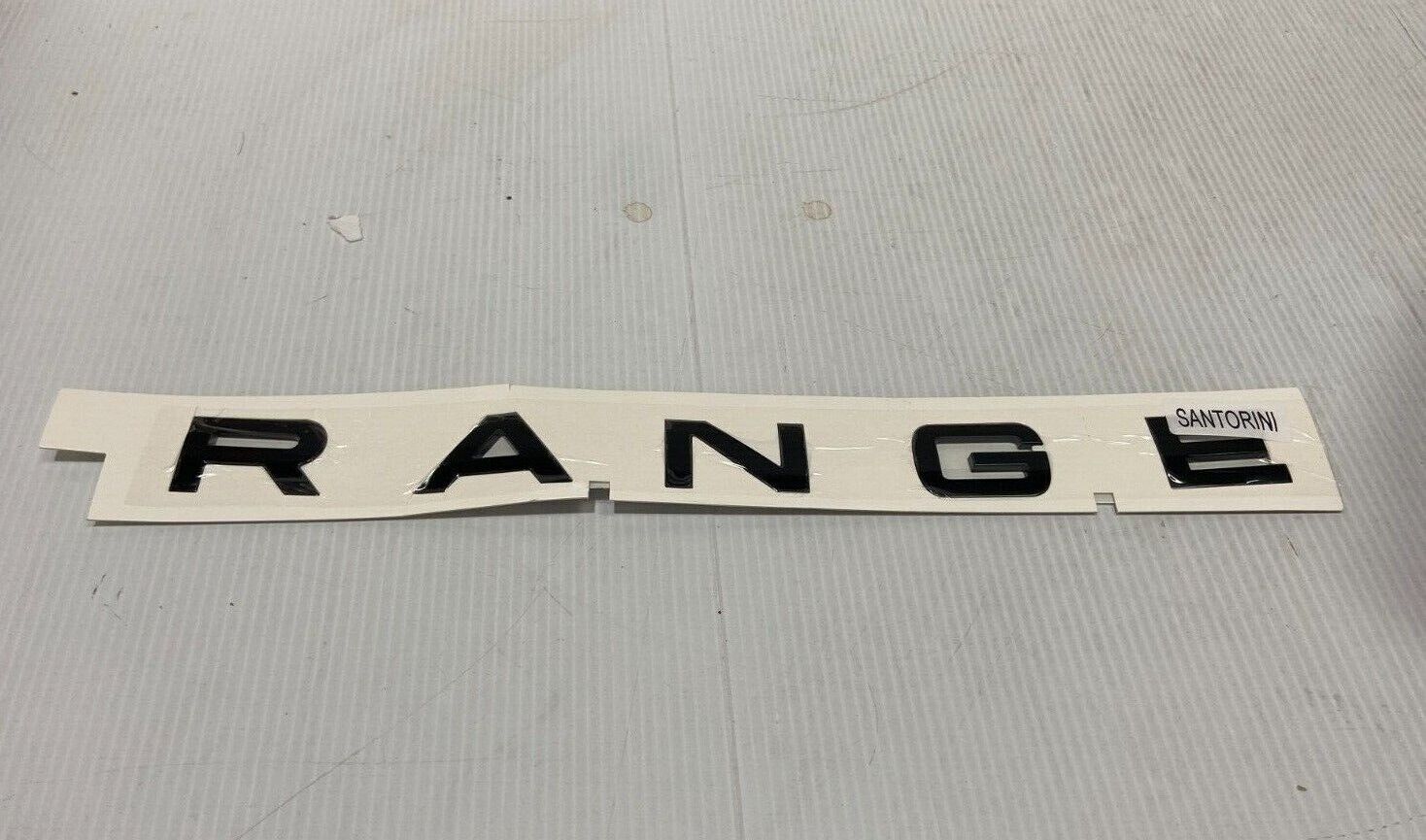 LR094379 - ÖN RANGE YAZI/SİYAH (3.0L V6/VOGUE) - Land Rover