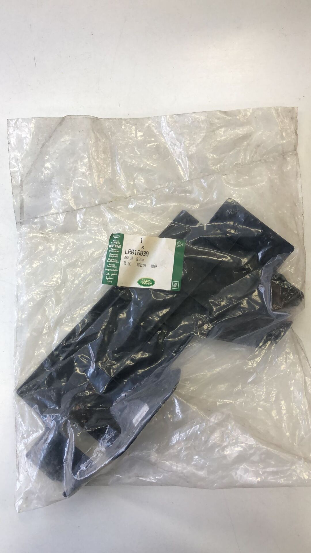 LR016838 - DEFLEKTÖR BRAKET SOL (2.7/NWD3) - Land Rover